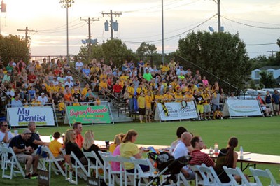 Members of the Red Dirt Brigade join other fans to cheer on the Oklahoma City FC men's team in a game against the Houston Dutch Lions on July 20. (Photo by Matt Caban)