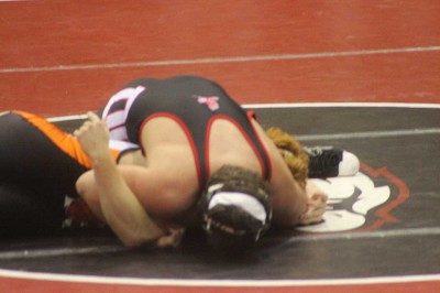 Nate Daniels turned his first takedown into a pin against Cale Stumpff. (Photo by Derek Lewis)